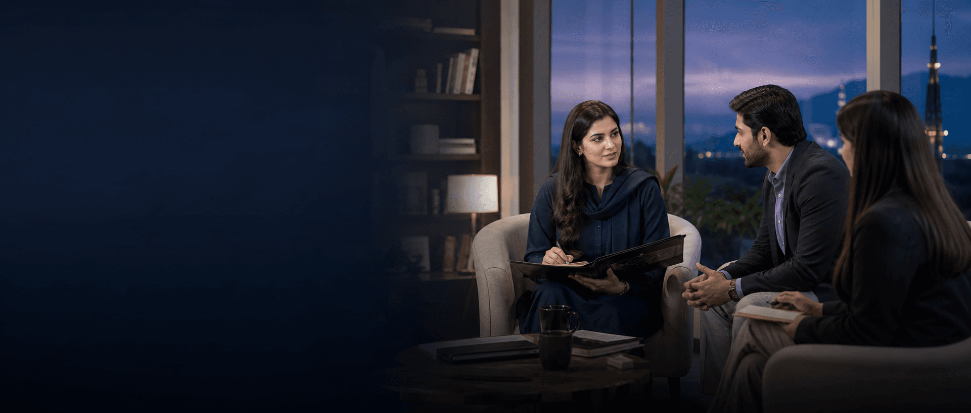 Pakistani recruitment advisor meeting with a client